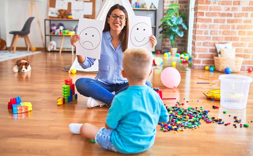 A boy with a therapist in ABA Therapy